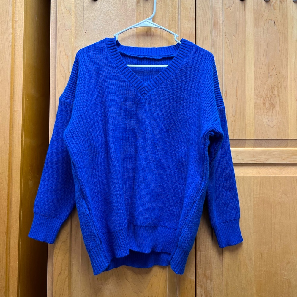 Bright blue sweater